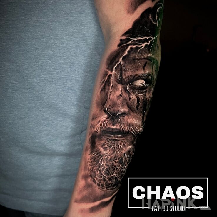 Tattoo Wiking 1 sesjas in black and gray motif and realistic style On the arm