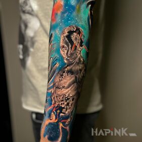 Tattoo Future - the future Chaos Tattoo Poznań on the forearm motif: colorful style: surrealistic