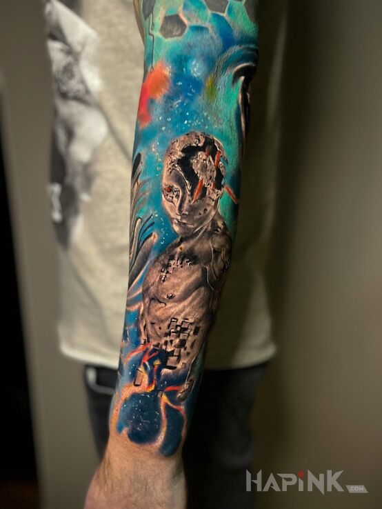 Tattoo Future - przyszłość Chaos Tattoo Poznań in fantasy motif and abstract style On the arm