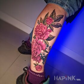 Tattoo Colorful peony flowers on the calf motif: floral style: realistic