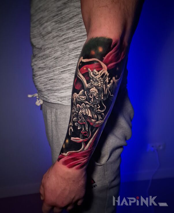 Tattoo Dota 2 in other motif and abstract style on the forearm
