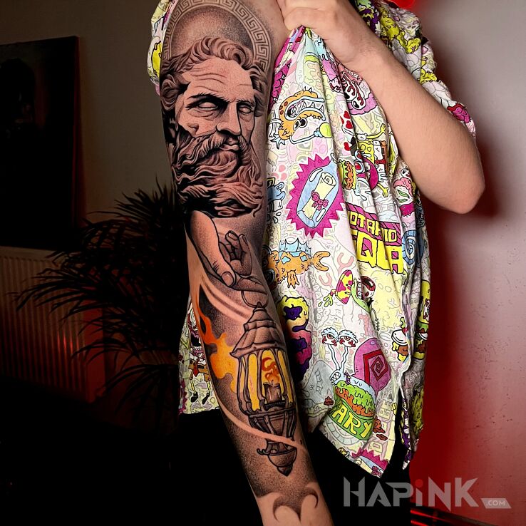 Tattoo Boski rękaw in objects motif and dotwork style on the upper arm