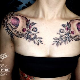 Tattoo Cat skulls tattoo on the collarbone motif: skulls style: realistic