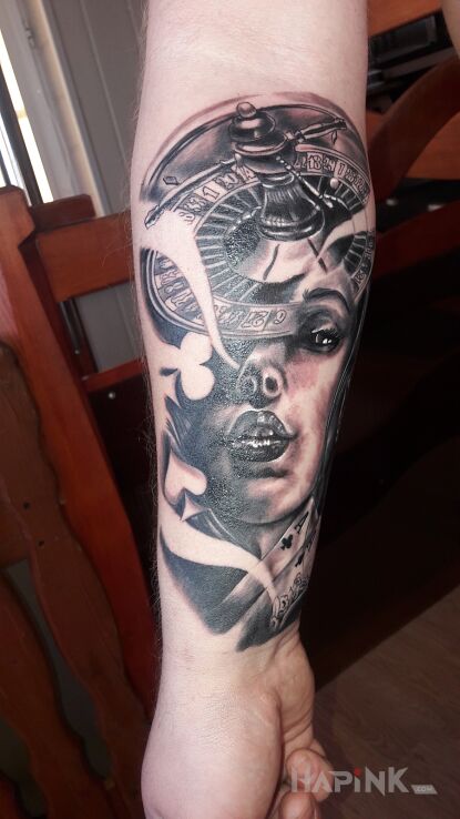 Tattoo Hazard in objects motif and realistic style on the forearm
