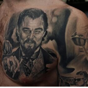 Tattoo Leonardo DiCaprio on the chest motif: black and gray style: realistic