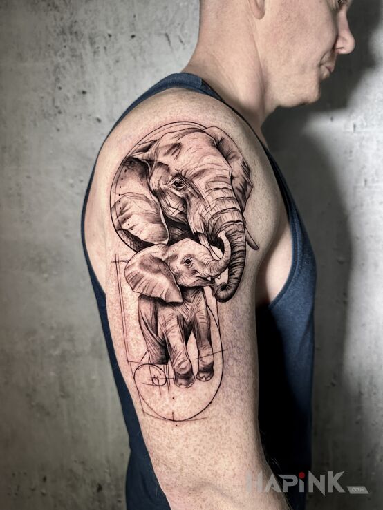 Tattoo Słoniki in animals motif and realistic style on the upper arm