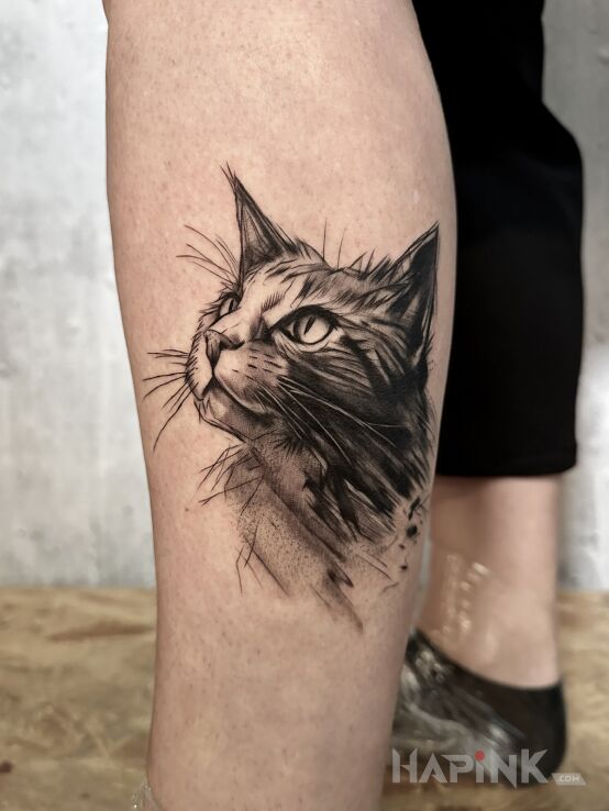 Tattoo Kicia Kocia in animals motif and sketch style on the calf