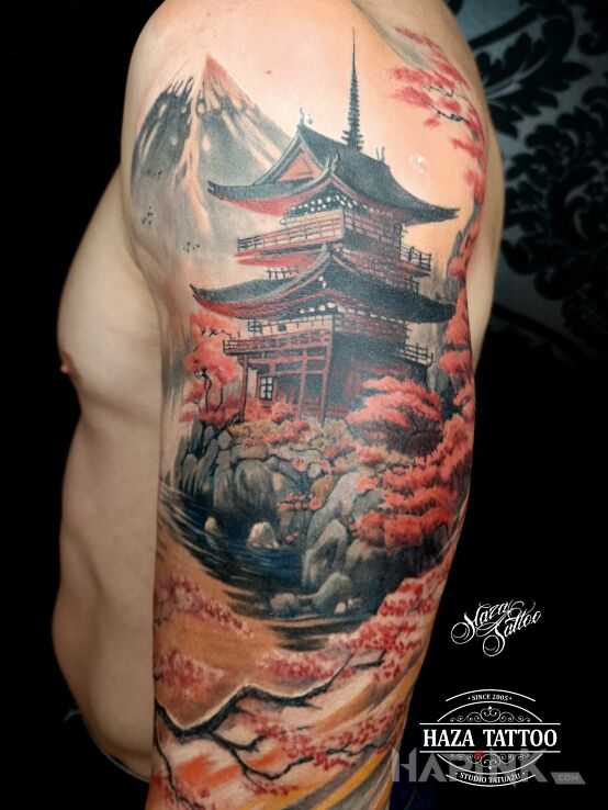 Tattoo Color temple tattoo in nature motif and realistic style on the upper arm