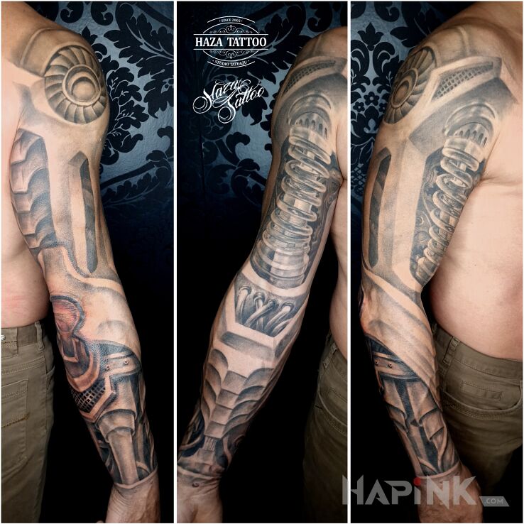 Tattoo Biomechanics tattoo in sleeves motif and biomechanics style on the upper arm