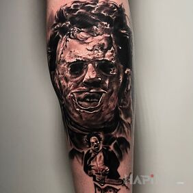 Tattoo Leatherface Horror on the calf motif: dark style: realistic