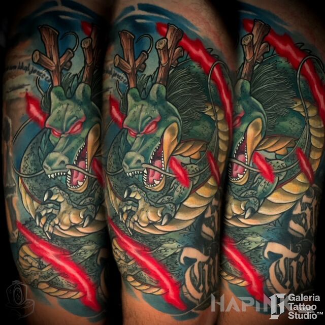 Tattoo Shen long cover-up dragon ball in dragons motif and graphic / illustrative style on the leg