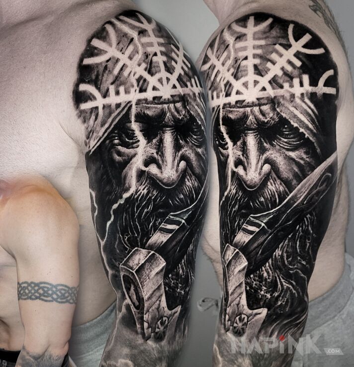 Tattoo Mędrzec Cover Up in black and gray motif and realistic style on the upper arm