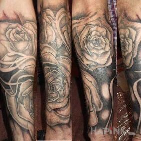 Tattoo Roses on the forearm motif: flowers