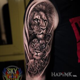 Tattoo Family themed tattoo on the upper arm motif: black and gray style: realistic