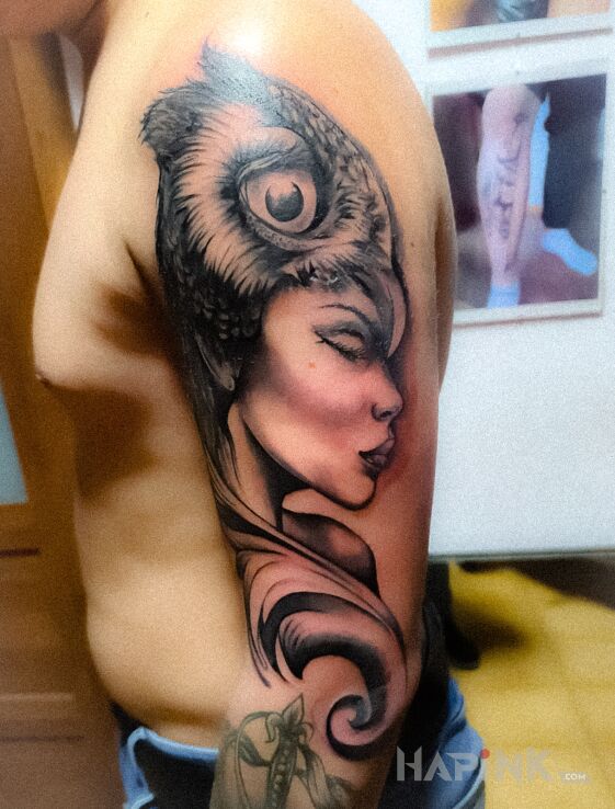 Tattoo Nordic madam in animals motif and realistic style on the upper arm