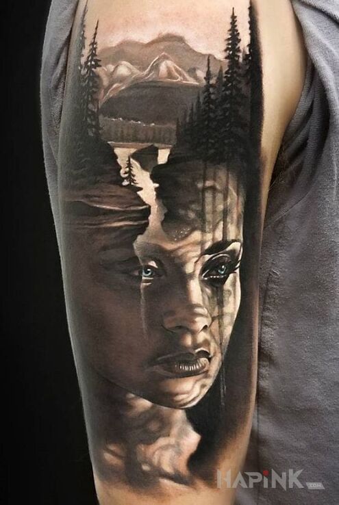 Tattoo Kobieta i gory in faces motif and realistic style on the upper arm