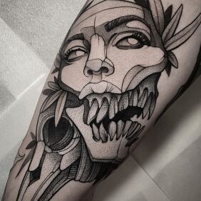 Tattoo Amber Tattoo on the leg motif: black and gray style: graphic / illustrative