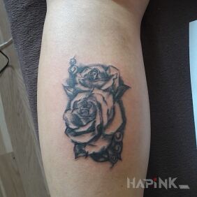 Tattoo Roses on the calf motif: flowers