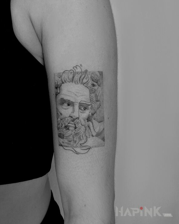 Tattoo Zeus z one linem in characters motif and realistic style On the arm