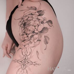 Tattoo Floral with ornament on the leg motif: floral style: graphic / illustrative