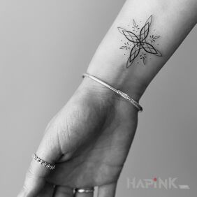 Tattoo Ornamental On the arm style: minimalistic