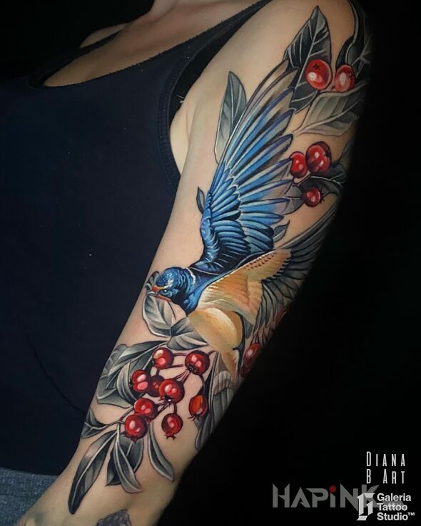 Tattoo Jaskółka jarzębina gałązki in animals motif and realistic style On the arm