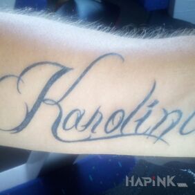 Tattoo My cura on the forearm motif: lettering