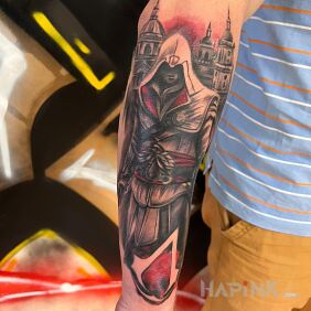 Tattoo Assassin's On the arm motif: black and gray style: realistic