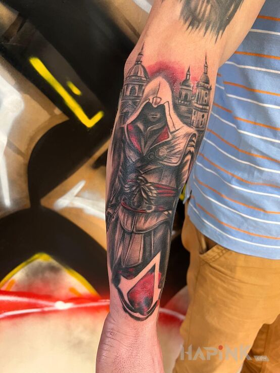 Tattoo Assassin's in characters motif and realistic style on the forearm