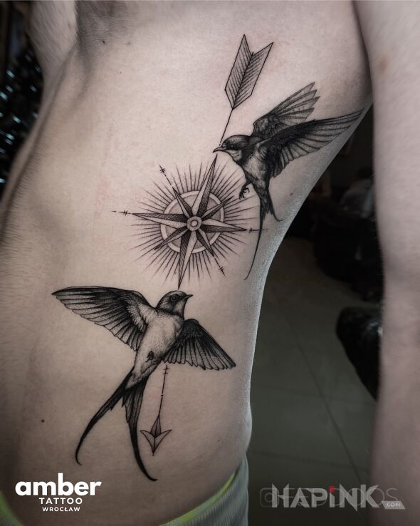 Tattoo Jaskóły in black and gray motif and graphic / illustrative style on the ribs