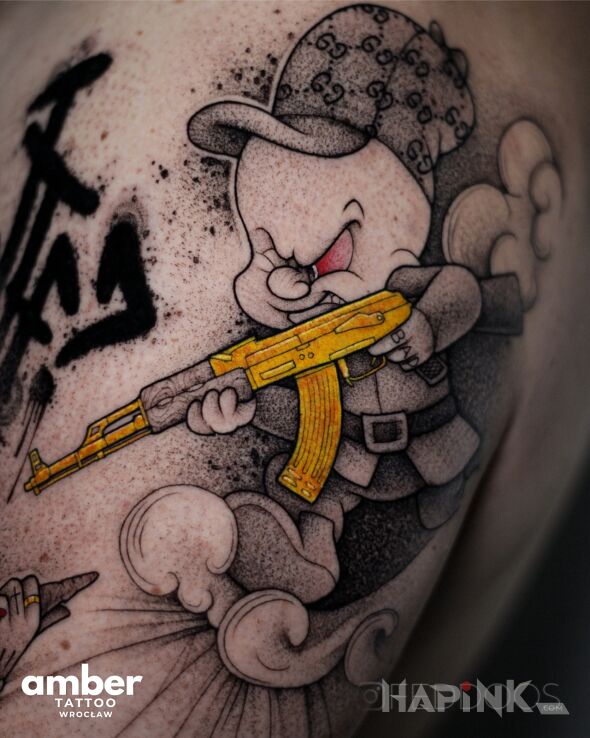 Tattoo Myśliwy ze złotym kałachem in funny motif and cartoon / comic book style On the arm