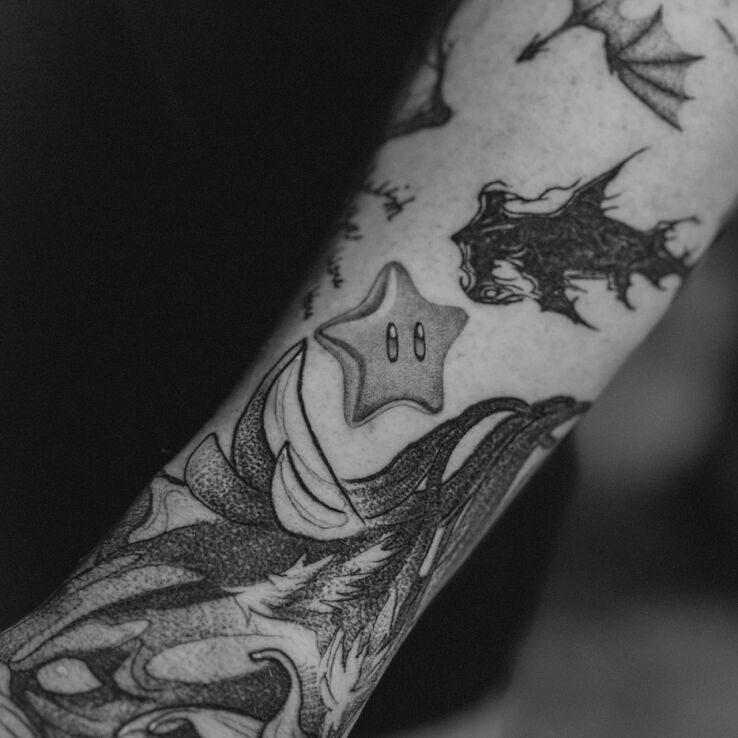 Tattoo Little star, shark, pacifier in animals motif and graphic / illustrative style on the forearm