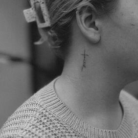 Tattoo Mini cross on the neck motif: lettering style: minimalistic