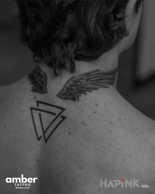 Tattoo Uskrzydlony in wings motif and graphic / illustrative style on the nape
