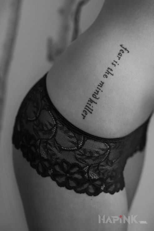 Tattoo Sexy napis in sexy motif on the ribs