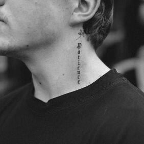 Tattoo Vertical word on the neck motif: black and gray style: calligraphy