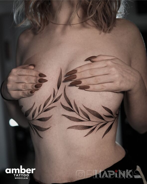 Tattoo Dwie gałązki in floral motif and graphic / illustrative style on the breast