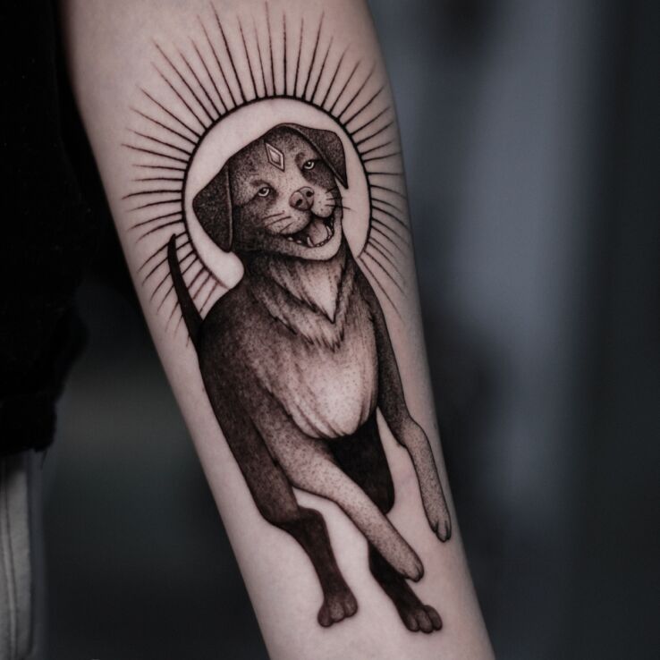 Tattoo Enlightened Dog in fantasy motif and dotwork style On the arm