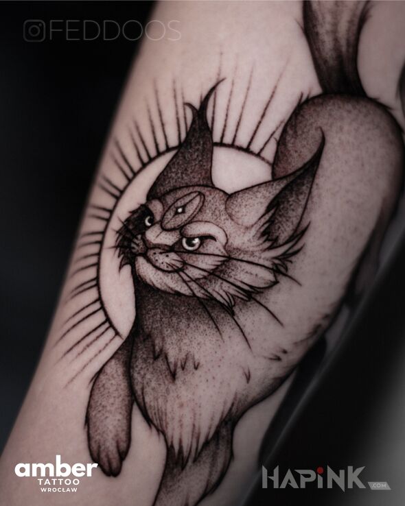 Tattoo Zwierzak in fantasy motif and dotwork style on the forearm