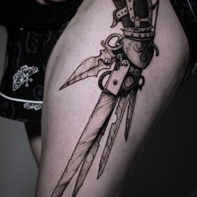 Tattoo Scissorhands on the thigh motif: fantasy style: graphic / illustrative