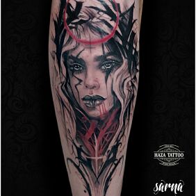 Tattoo Woman with a sharper edge on the calf motif: black and gray style: realistic