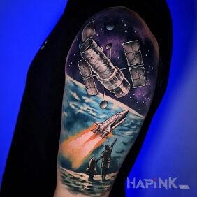 Tattoo View of the cosmos On the arm motif: cosmos style: realistic