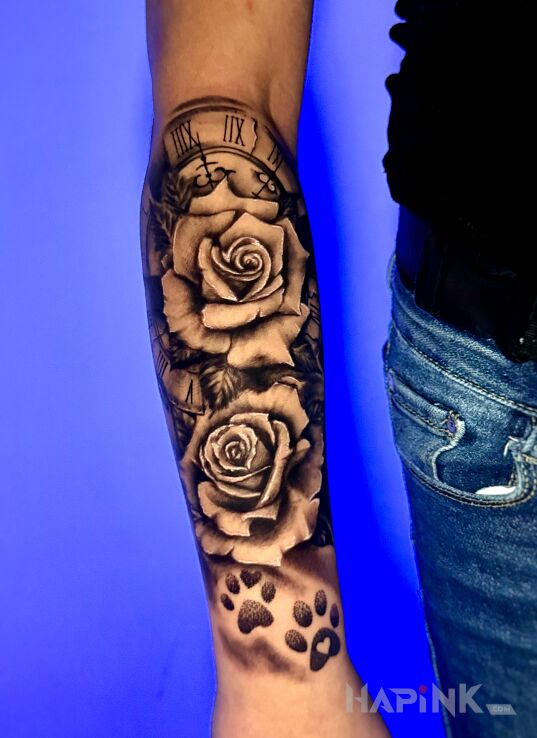 Tattoo Róże dwie i psie łapki in flowers motif and realistic style On the arm