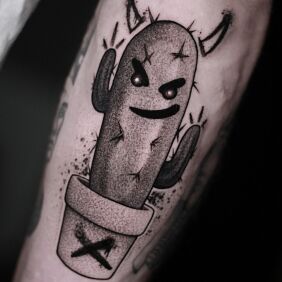Tattoo Cactus graffiti on the leg motif: black and gray style: graphic / illustrative