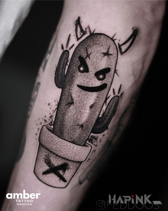 Tattoo Graffiti kaktusa in black and gray motif and dotwork style on the calf