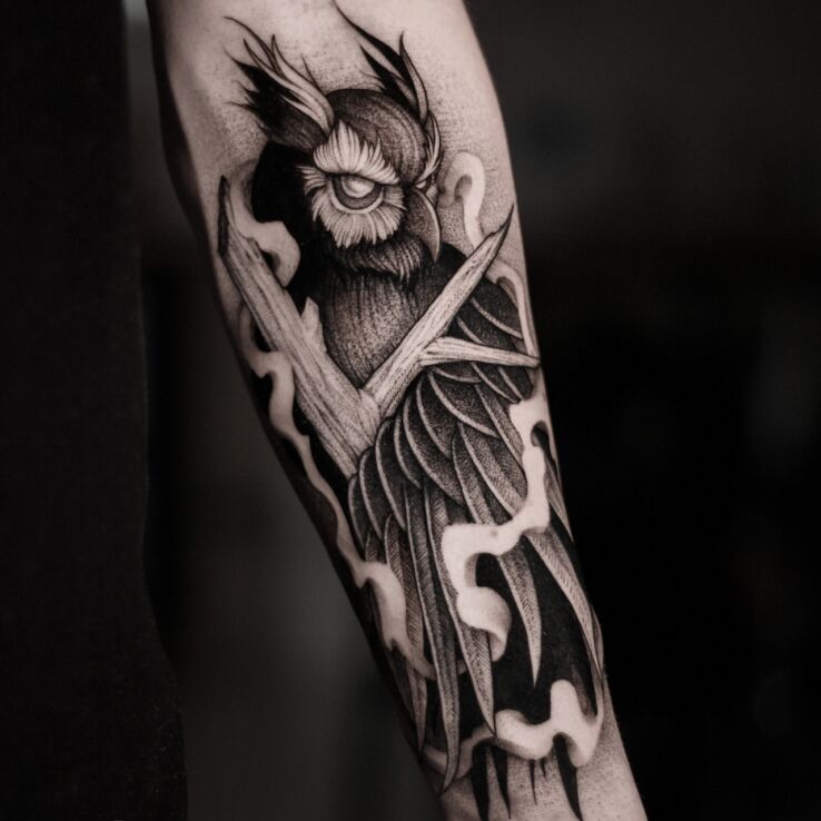 Tattoo Majestic owl in dark motif and dotwork style On the arm