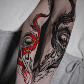 Tattoo Dragons like from manga on the forearm motif: dragons style: dotwork