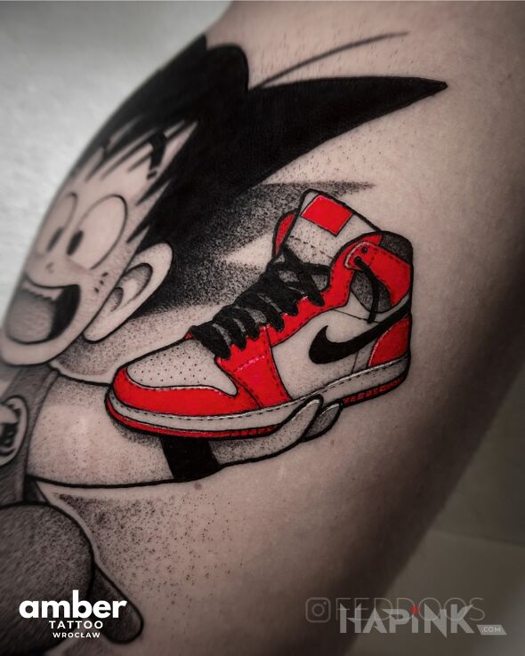 Tattoo Kolorowe trampki Nike in characters motif and dotwork style on the calf