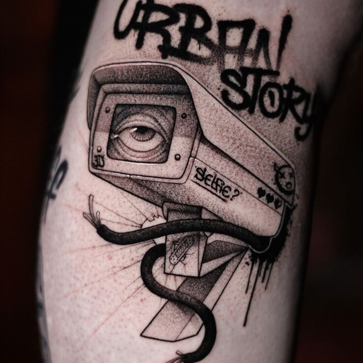 Tattoo Surveillance camera with graffiti in lettering motif and dotwork style on the leg