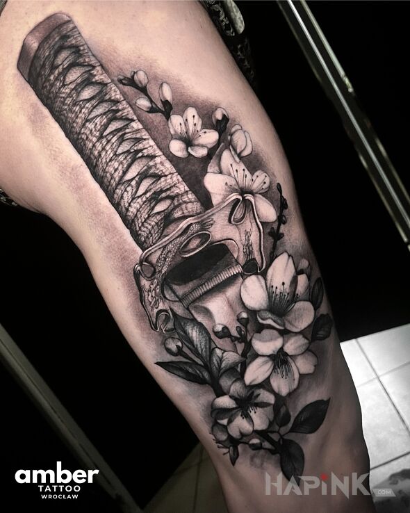 Tattoo Katana w kwiatach in objects motif and realistic style on the leg